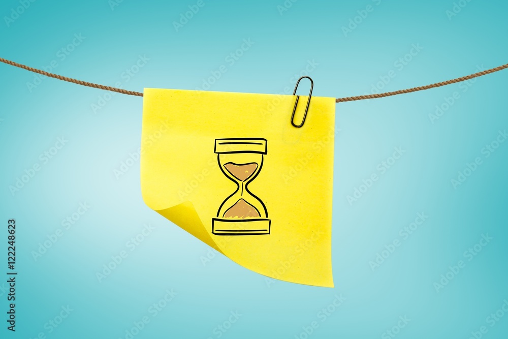 hourglass on post-it with blue background