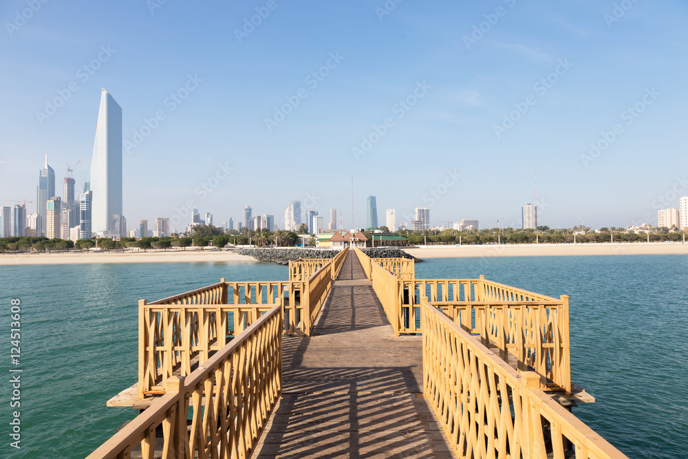 Wooden Pier and Skyline of Kuwait City