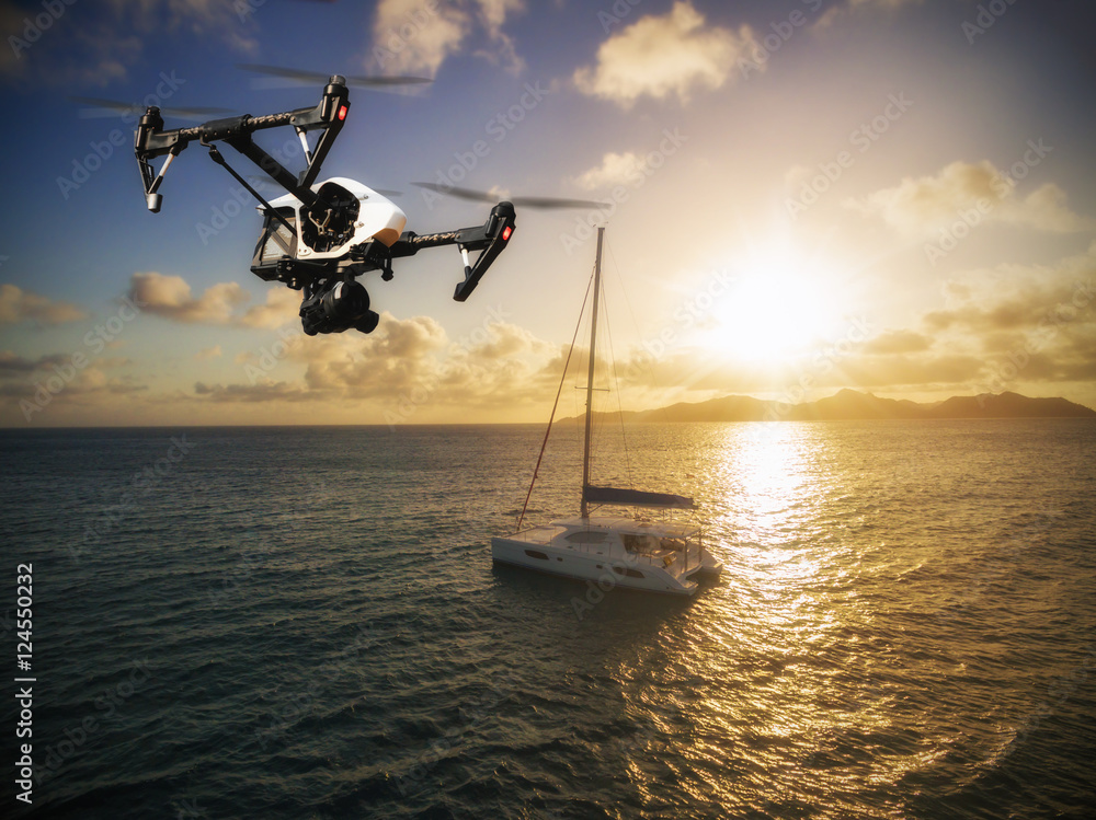 Drone flying above catamaran