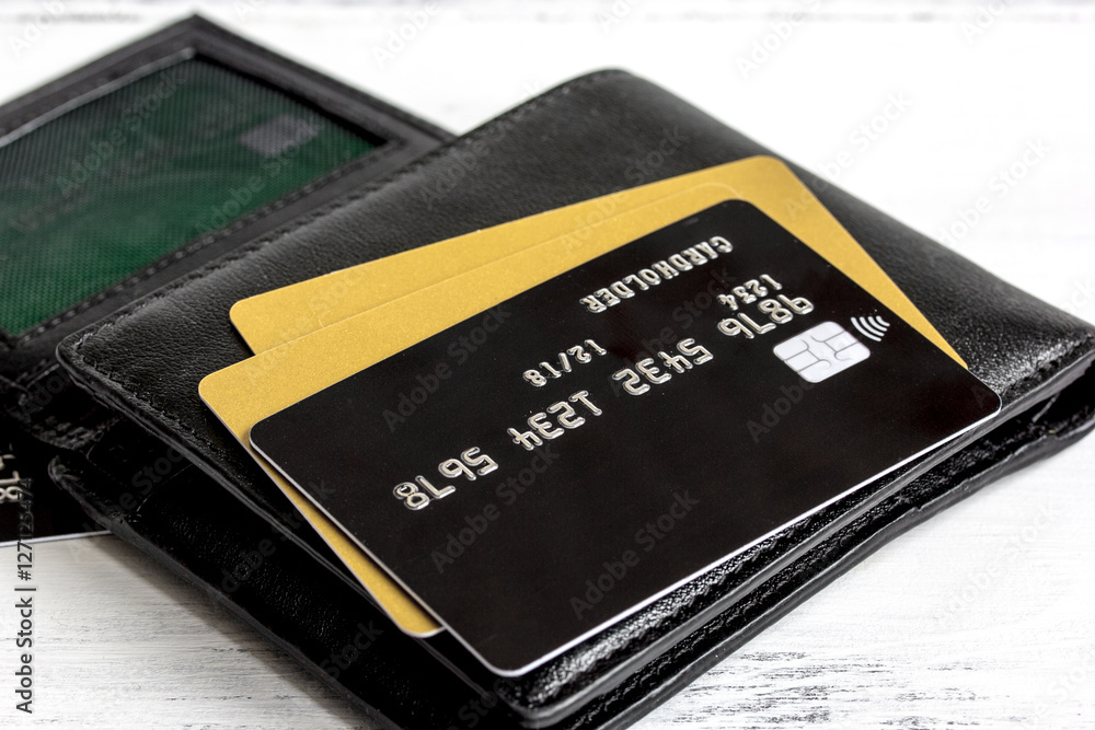 Credit cards on wooden background - online shopping