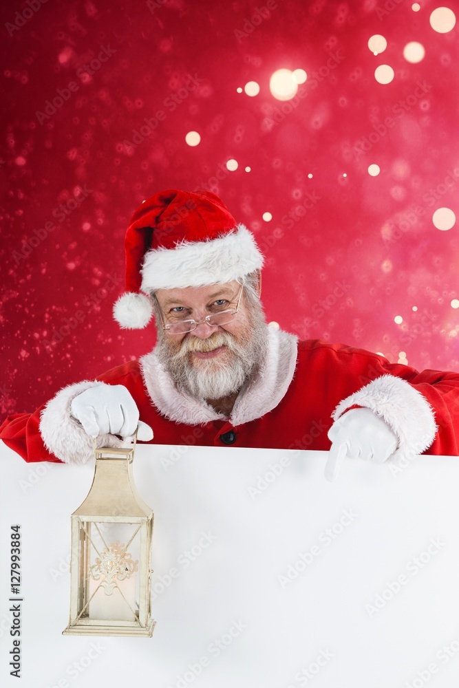 圣诞老人举着圣诞灯的合成图像