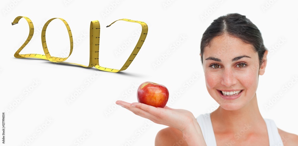 手拿苹果节食的女性合成图