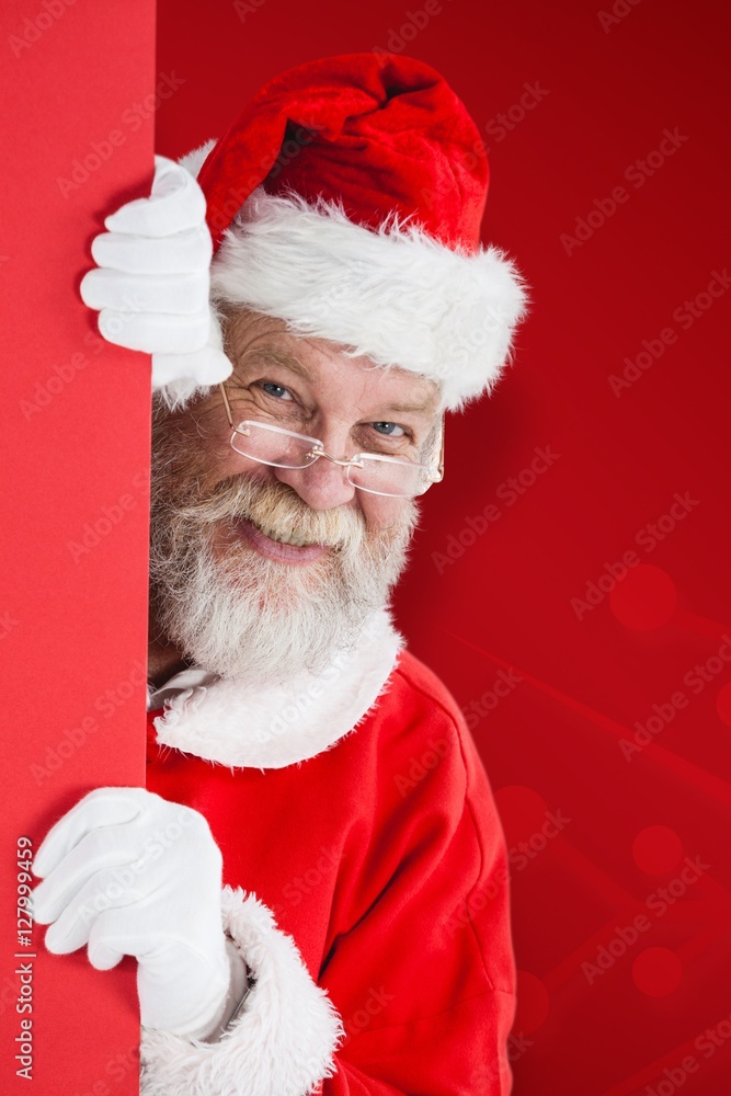 圣诞老人从红板上偷看的合成图像