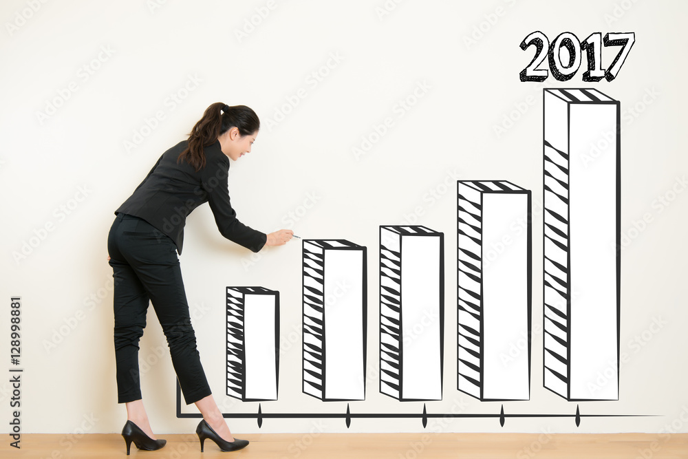 business woman drawing over target achievement graph