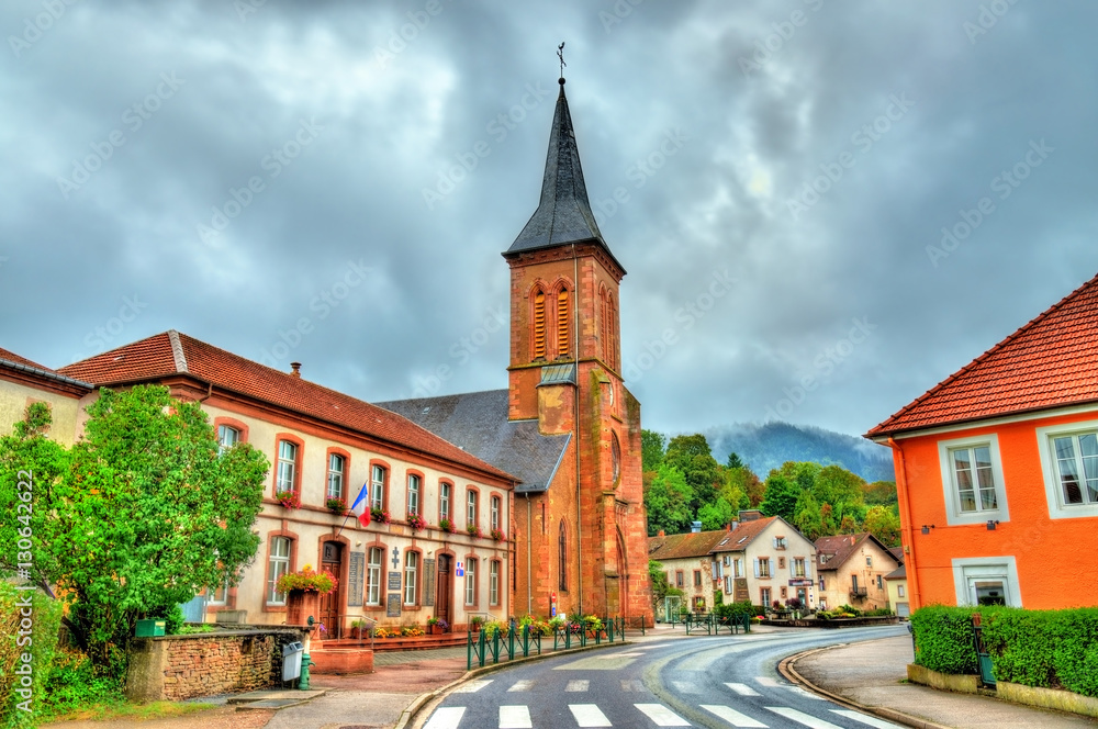 La Petite-Raon, town hall and the church. Vosges Department, Fra