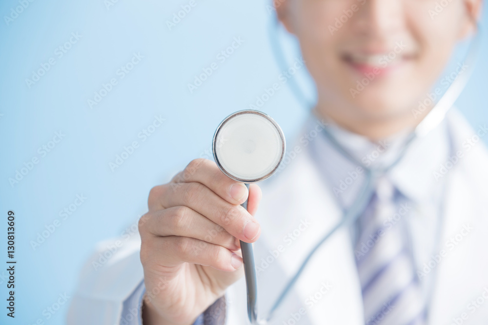 male doctor show stethoscope
