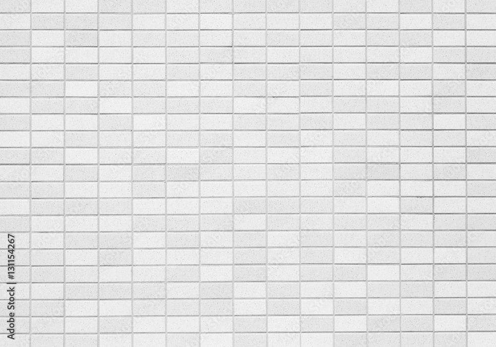 White brick stone wall seamless background and texture.