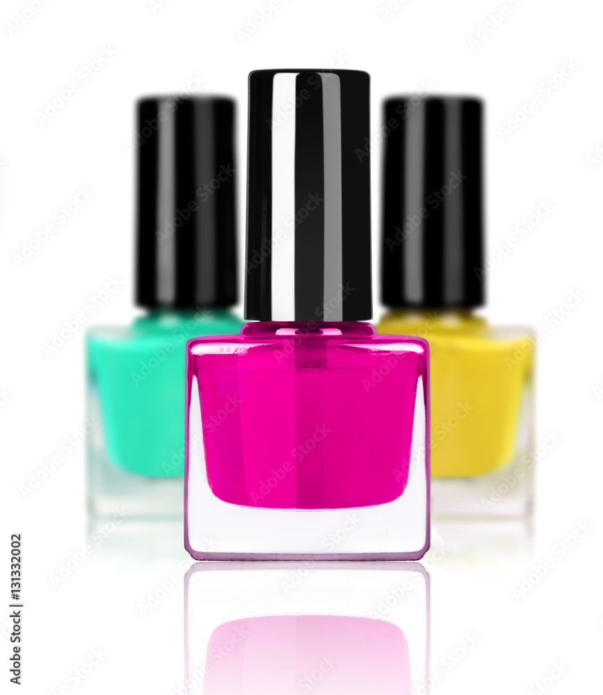 Group of colorful nail polishes isolated on white background