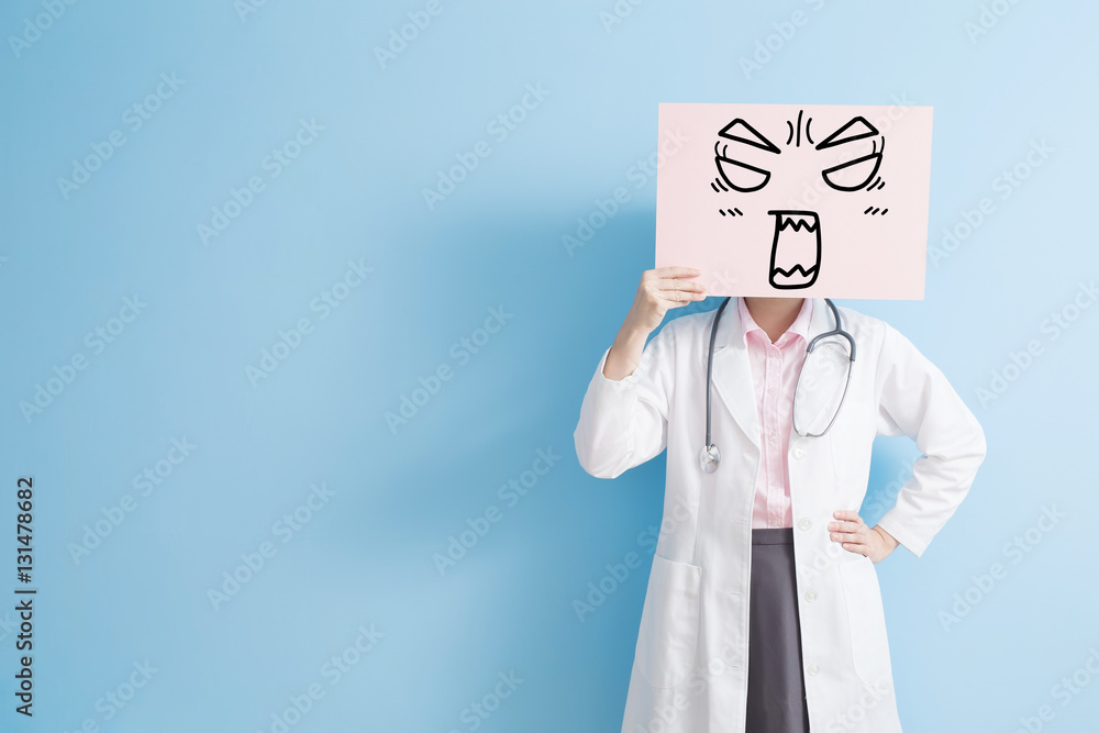 woman doctor show angry billboard