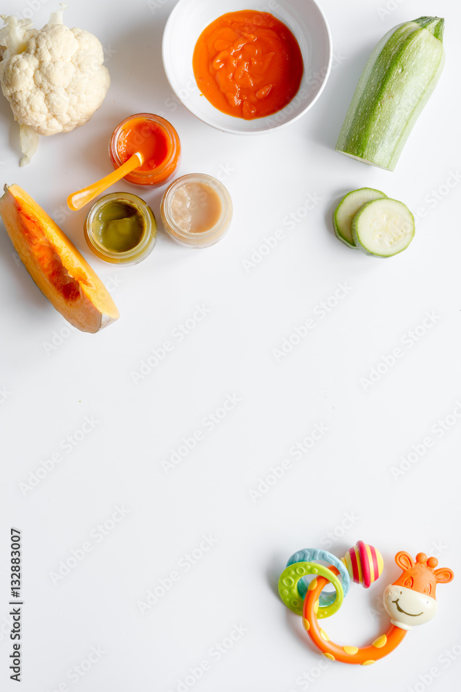 cooking vegetable puree for baby on white background top view