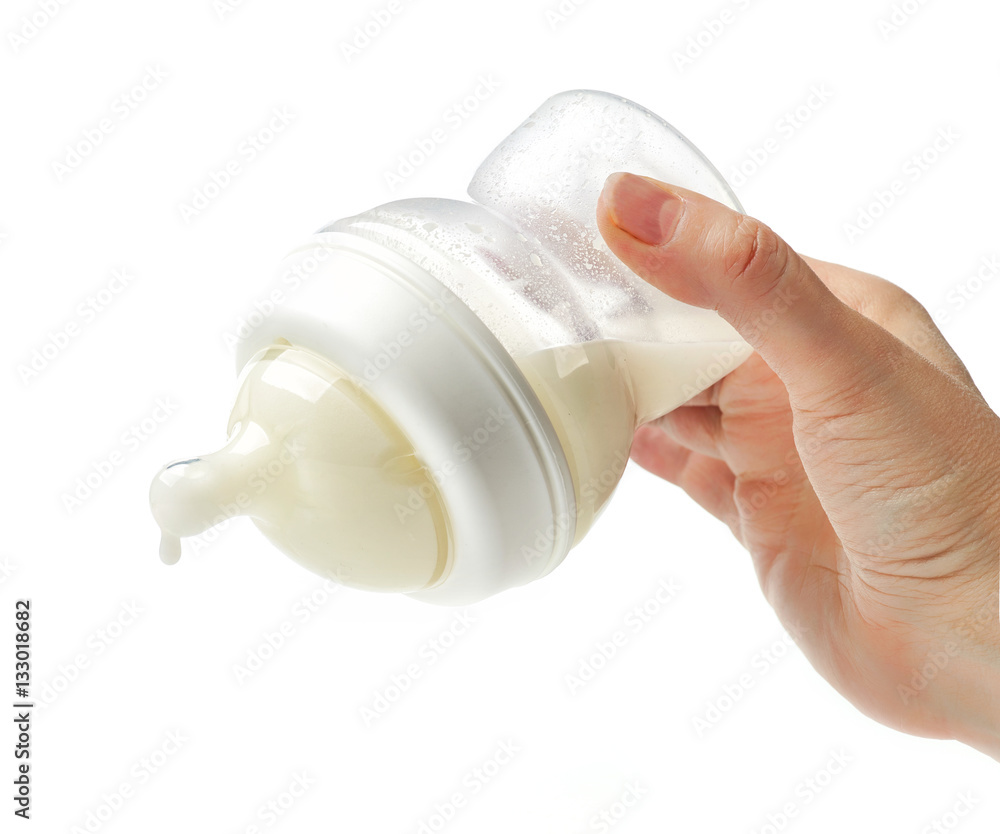baby milk bottle in mother hand