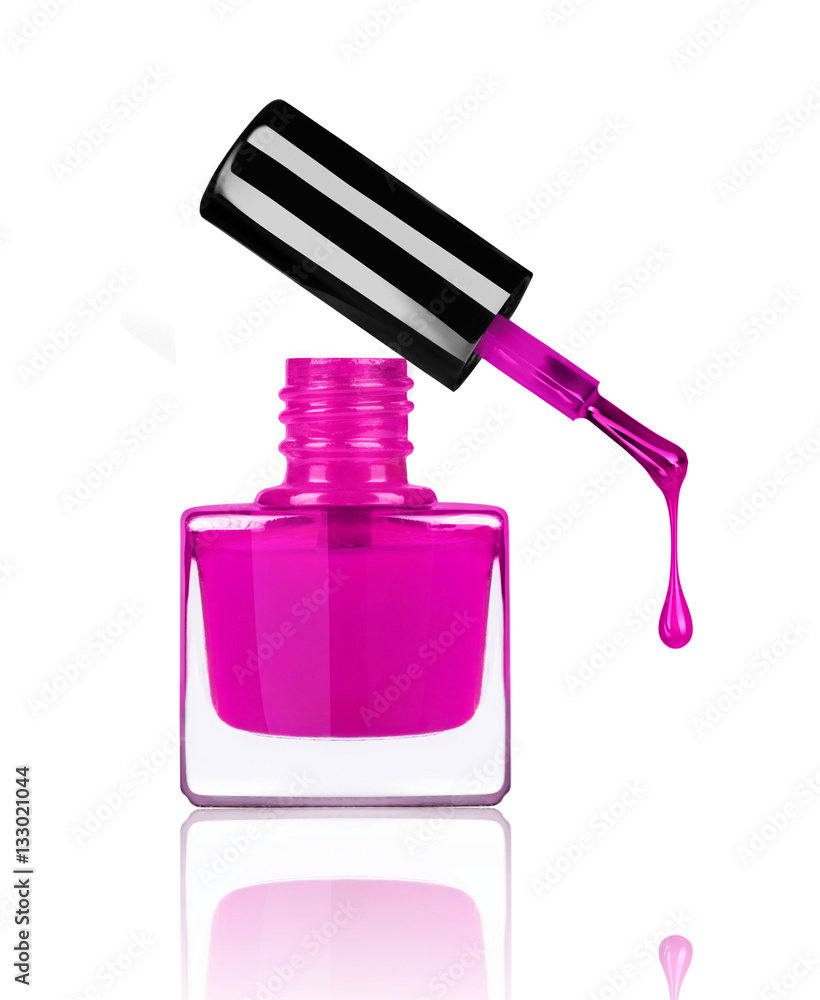 nail polish dripping from brush on white background