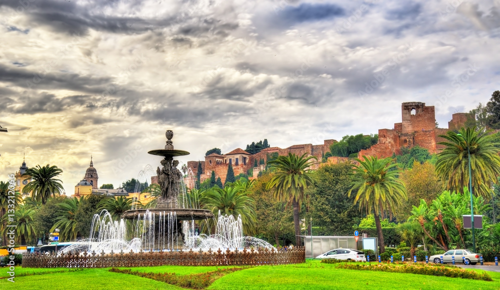 Tres Gracias Fountain and Alcazaba Castle in Malaga - Adalusia, Spain