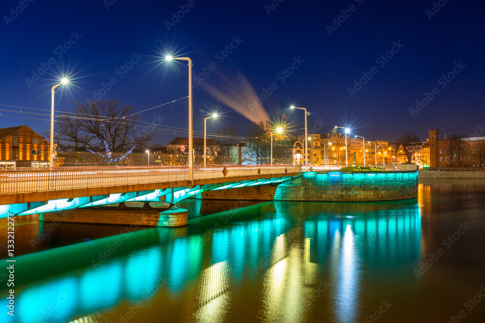 Bridge over Odra river in Wroclaw at night, Poland