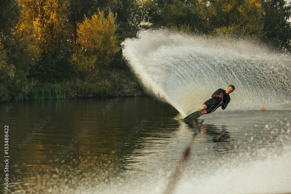 Wakeboarder in action on the lake