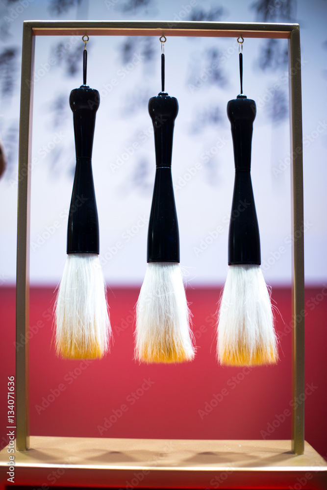 hanging calligraphy brushes on steel frame