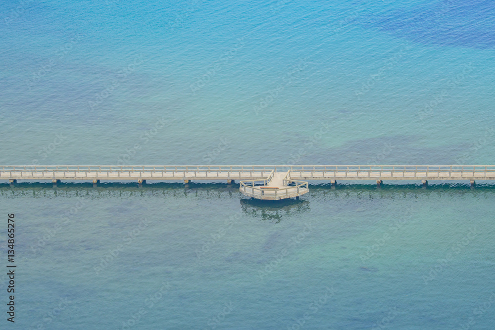 Concrete bridge in the sea way to the harbor
