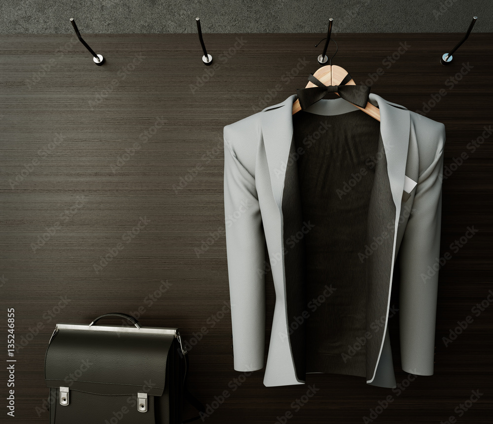business jacket on textured wall with briefcase concept photo background