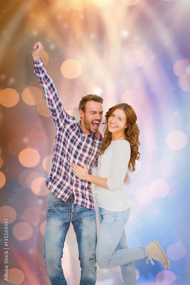 Composite image of young couple embracing and posing