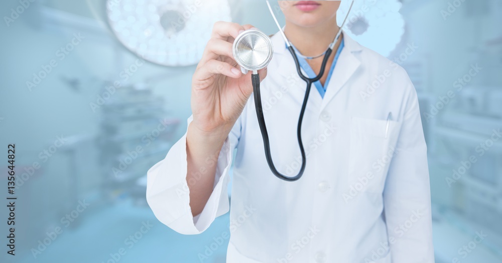 Doctor using stethoscope against digitally generated background