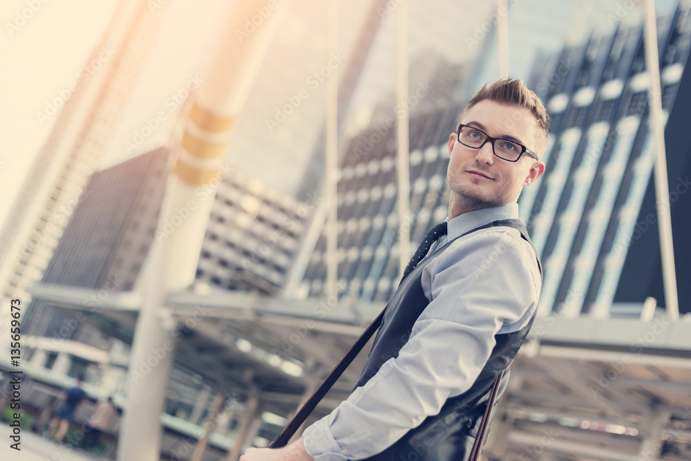 smart handsome business man outdoor with urban city background
