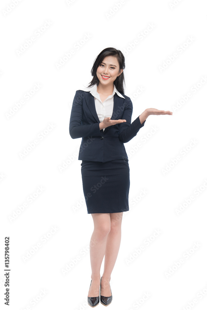 Full body of an attractive young businesswoman showing by hands