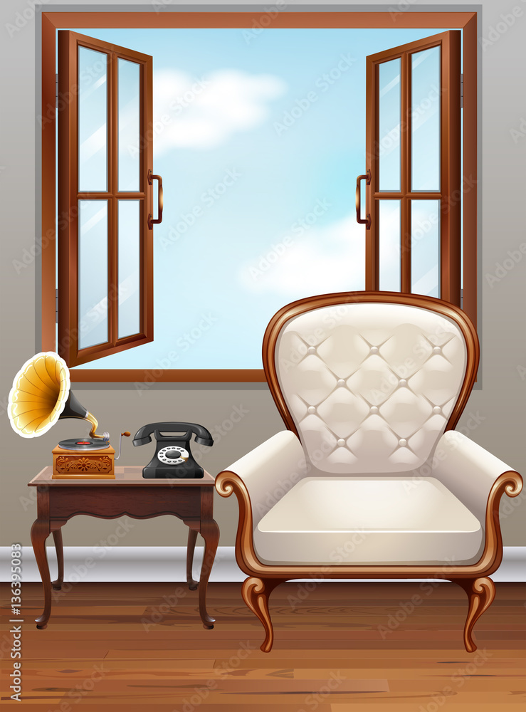 Room with white  armchair and vintage phone