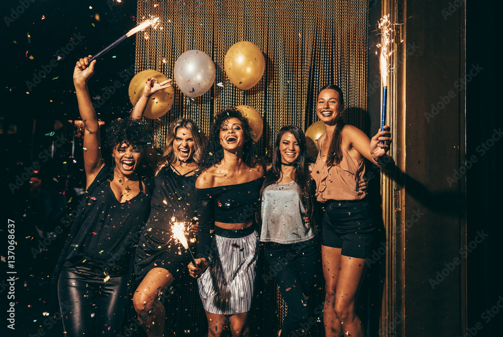 Group of women having party at nightclub