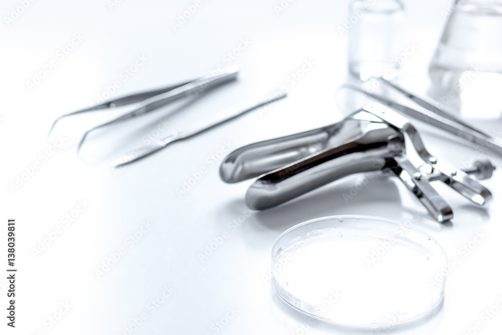instruments of gynecologist on white background