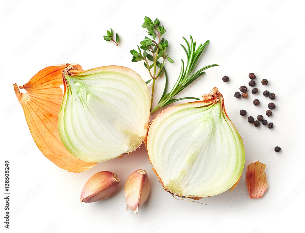 onions and spices on white background