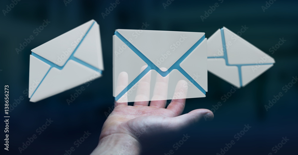 Businessman holding 3D rendering flying email icon in his hand