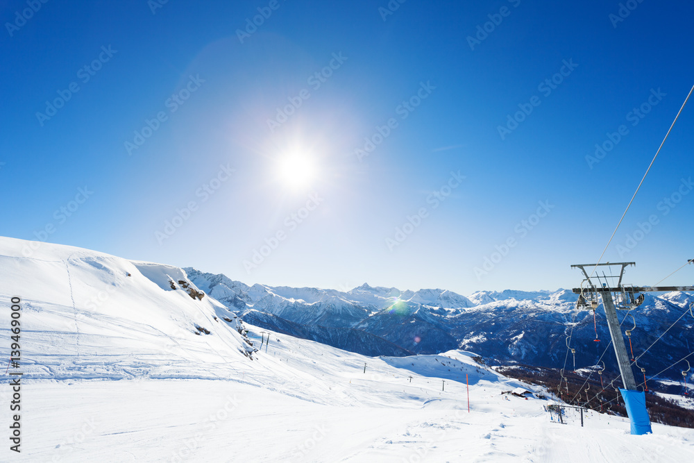 Beautiful view of mountain ski resort at sunny day
