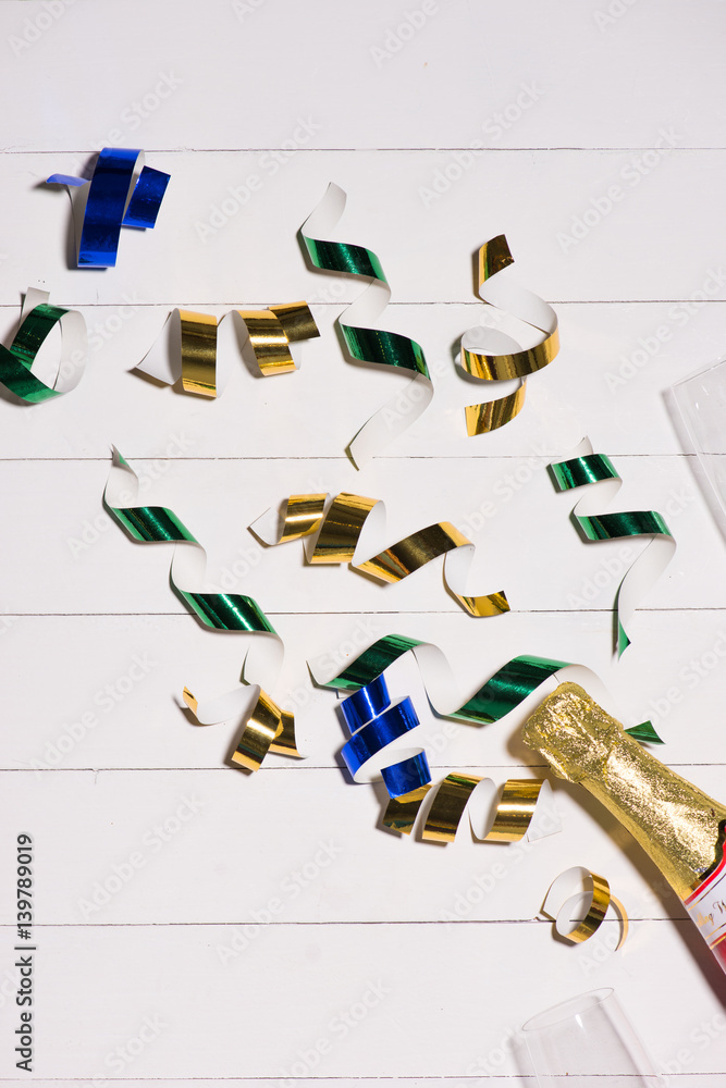 Celebration Flat lay. Champagne bottle with copyspace on wooden background