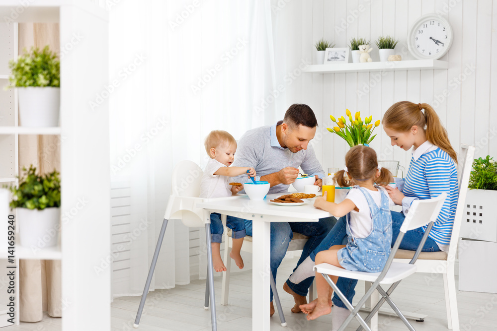 Happy family  at breakfast