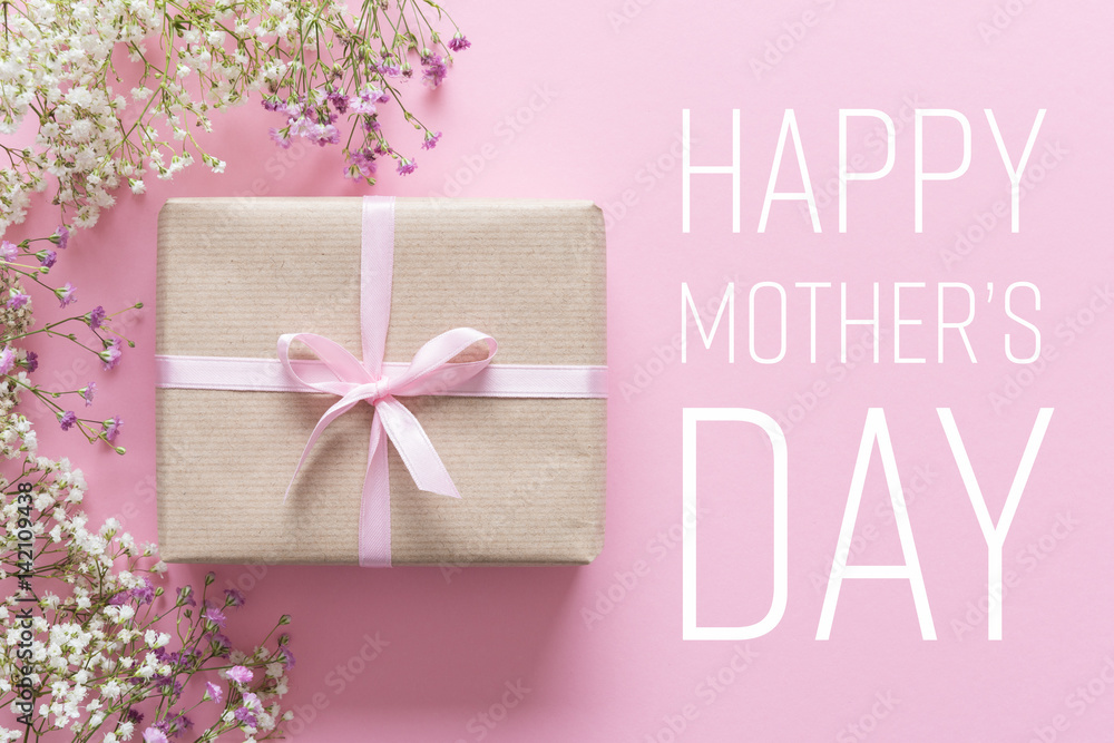 Mothers day card, pink background with white flowers and a present