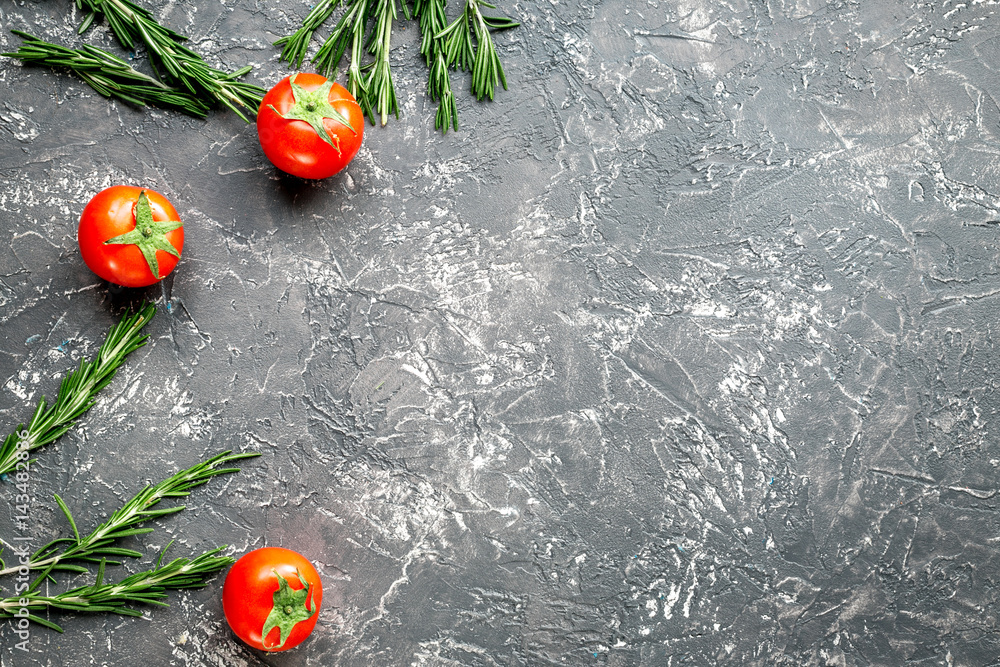 restaurant kitchen with tomato and rosemary on gray background top view mockup