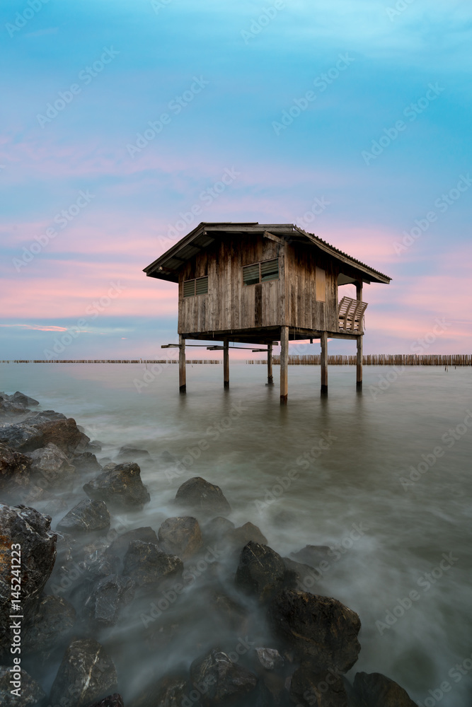 Old house at seashore in Samutsakorn province, center of Thailand.