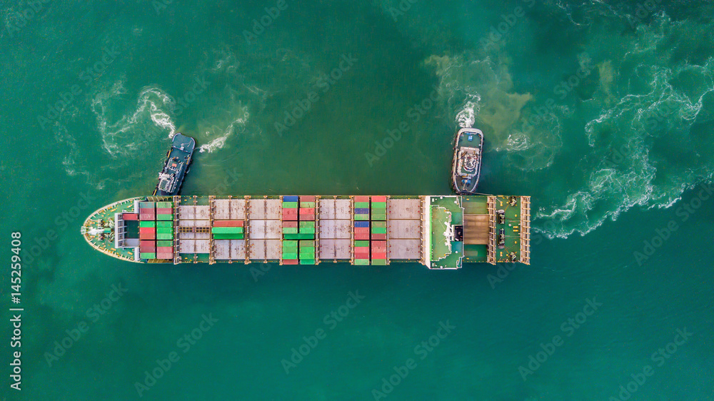 Aerial view from drone, container ship in import export and business logistic by crane