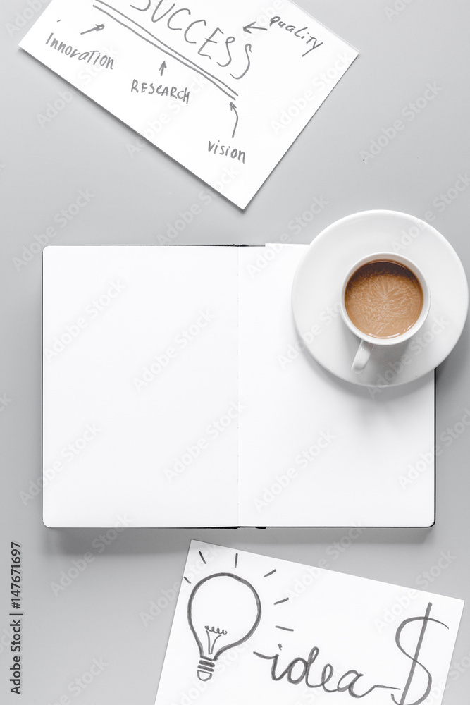 business plan with copybook and chart gray table background top view mockup