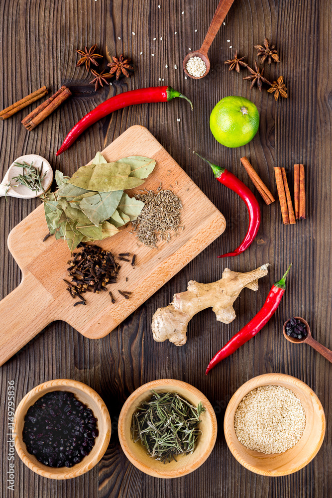 Flat lay herb and spices on rustic kitchen background