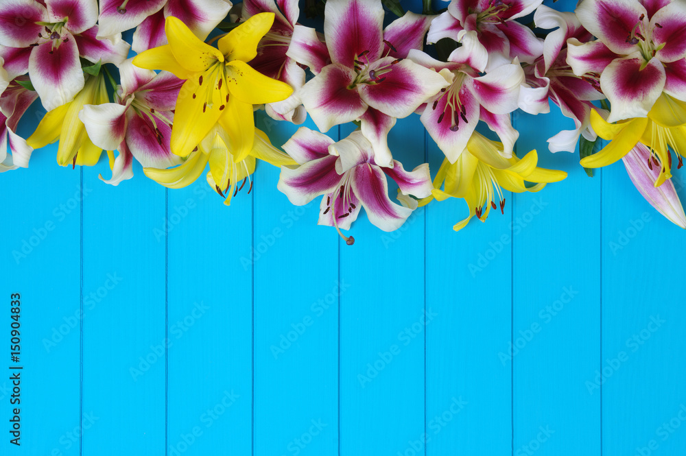  lily flowers on wooden planks