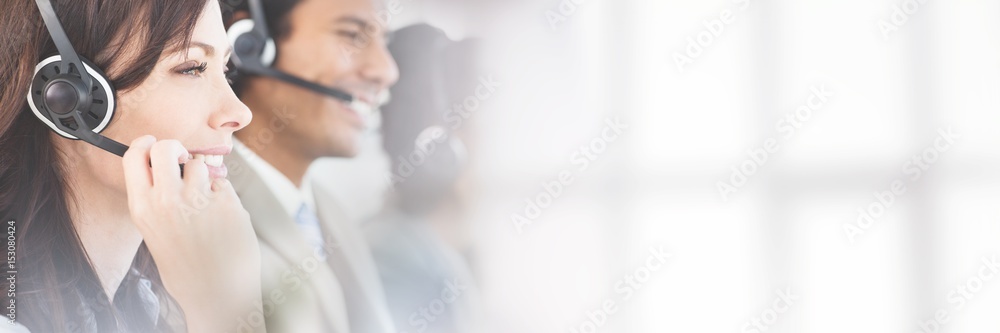 Side view of businesswoman working with headset