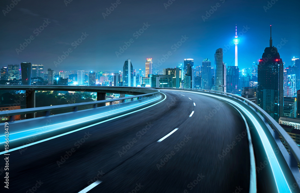 Moving forward motion blur flyover with city skyline ,night scene .