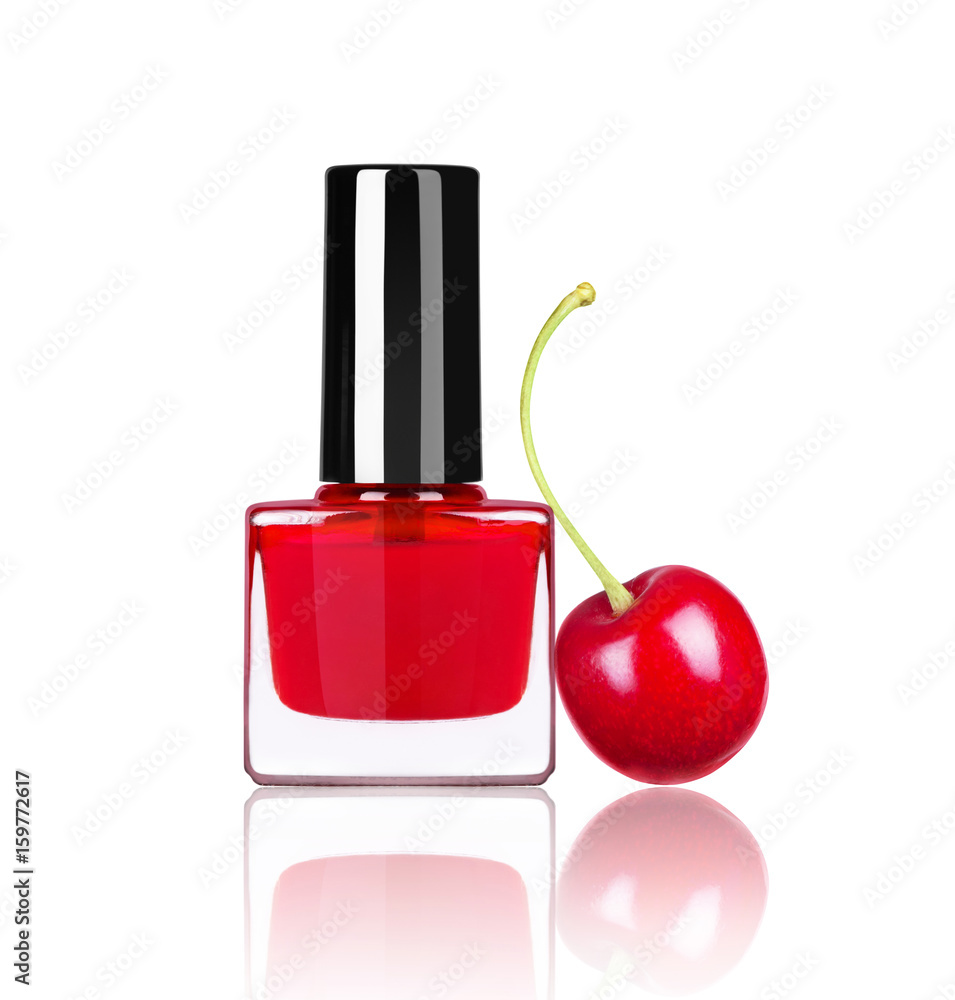 bright nail polish with cherry isolated on white background