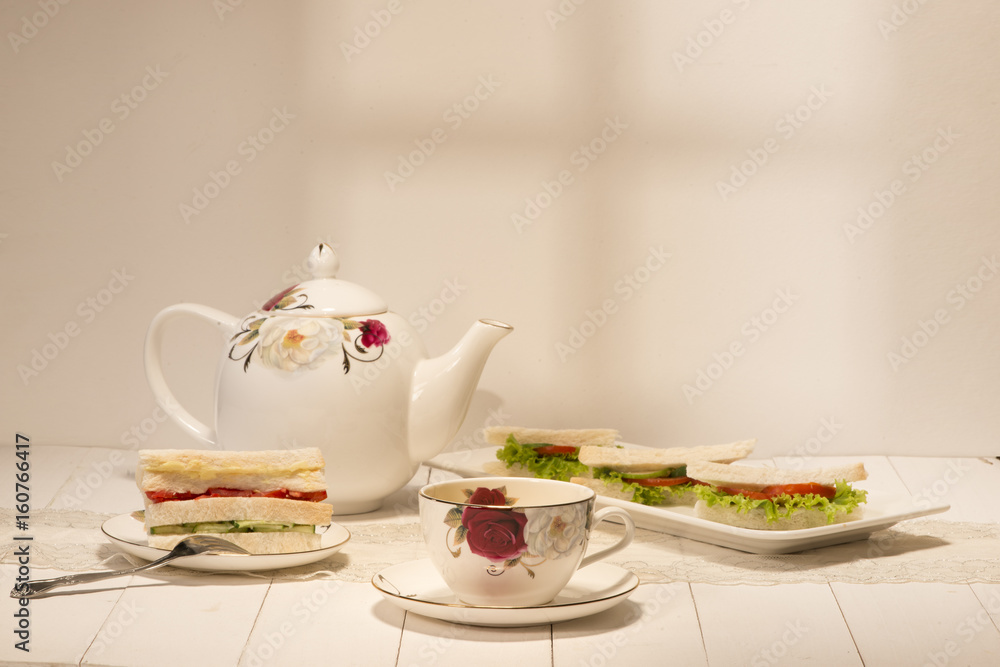 Afternoon tea table. tea set with sandwiches