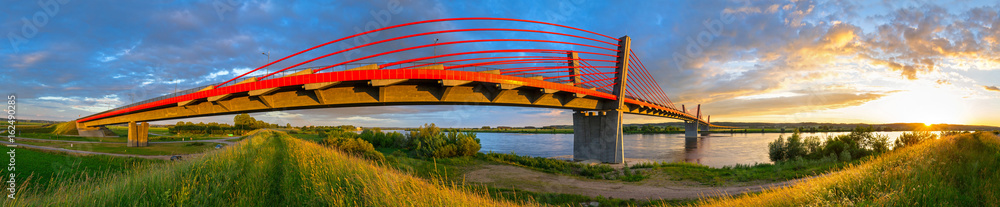 Cable stayed bridge over Vistula river in Poland at sunset