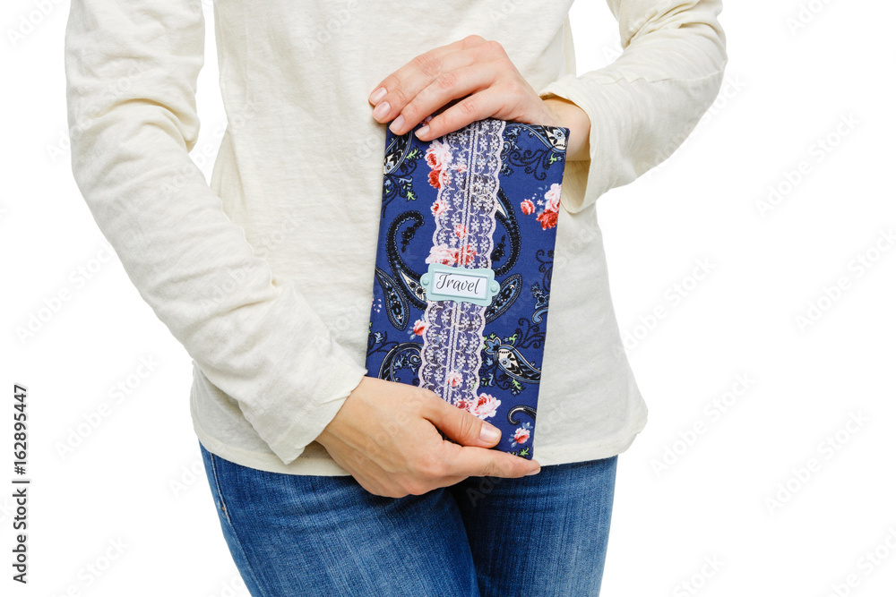 beautiful scrapbooking folder in woman hand