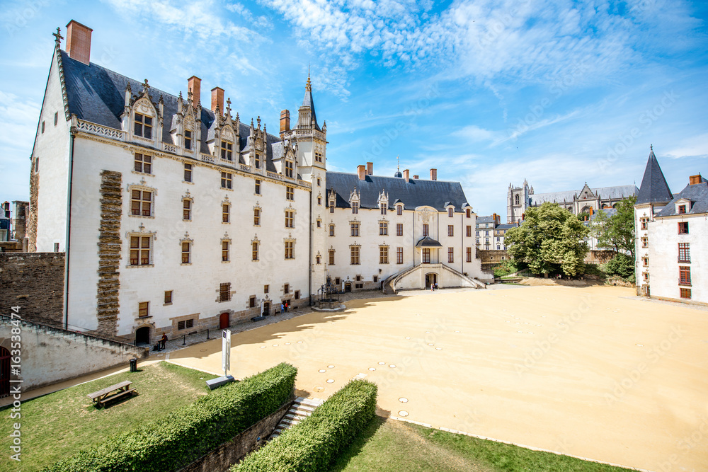 View on the castle of Dukes of Brittany during the sunny weather in Nantes city in France