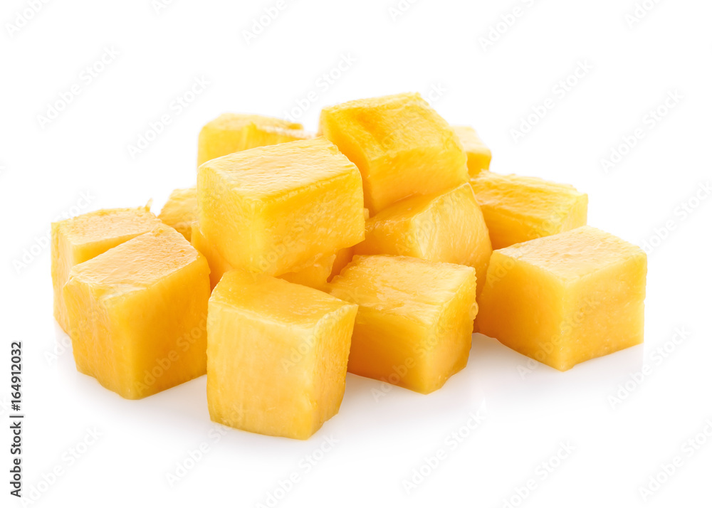 Mango slice cut to cubes isolated on white background.