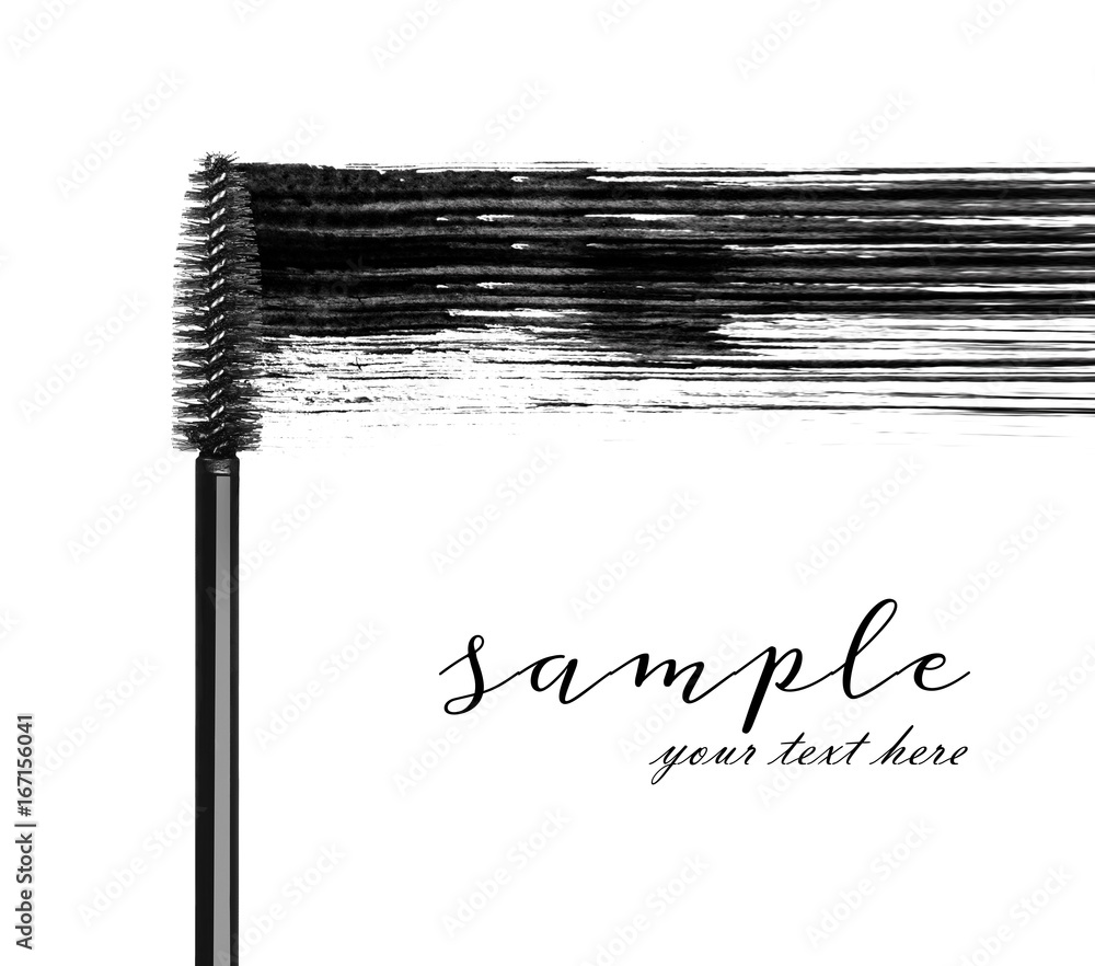 Stroke of black mascara with applicator brush close-up, on white background